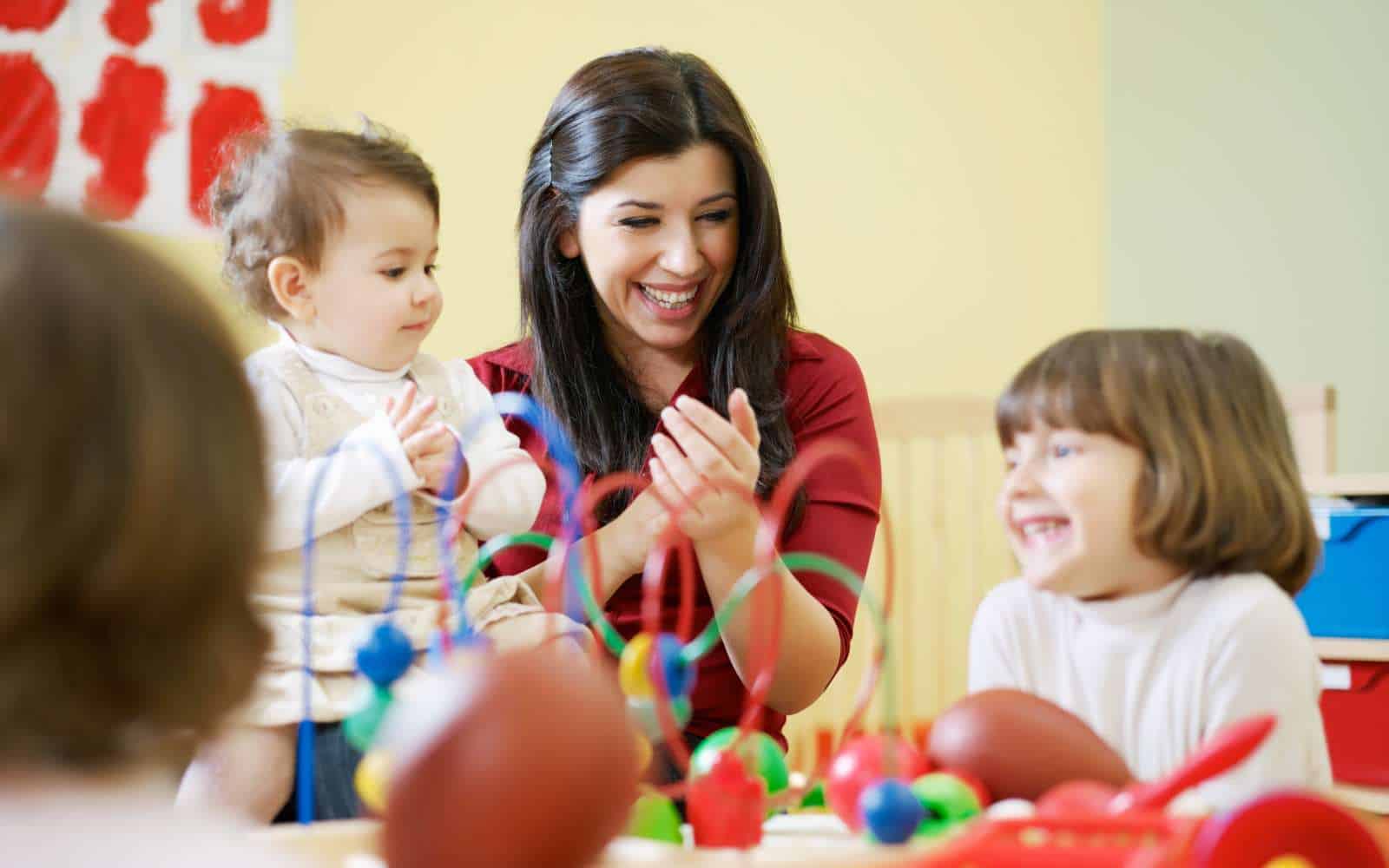 lady with children at long day care Concord NSW
